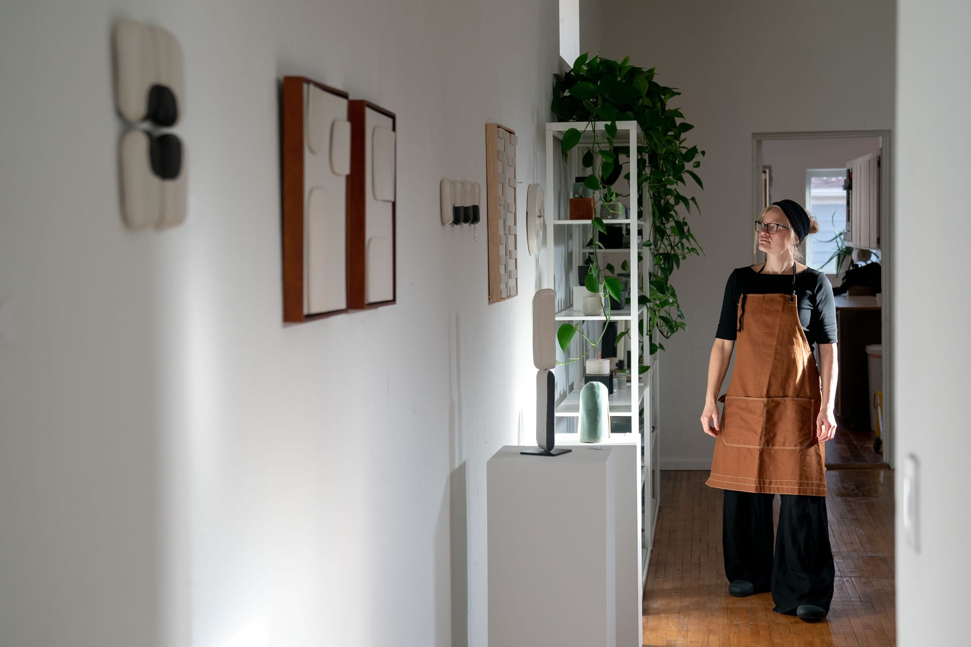 An artist walks through her studio.