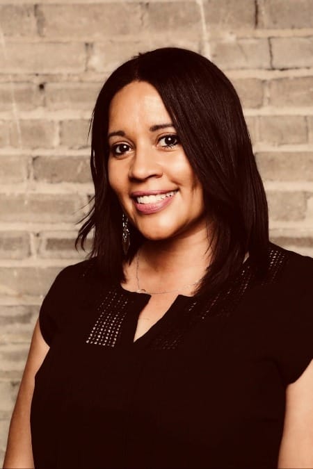 Woman poses for a portrait.