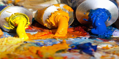 See the art and read the story here! Yellow, orange and blue paint tubes squirt paint.