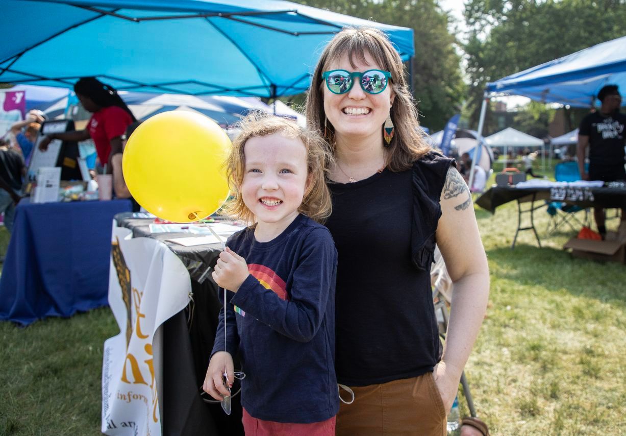 Project Optimist Founder Nora Hertel and her 4-year-old at the Juneteenth celebration in St. Cloud on Friday, June 16, 2023. 