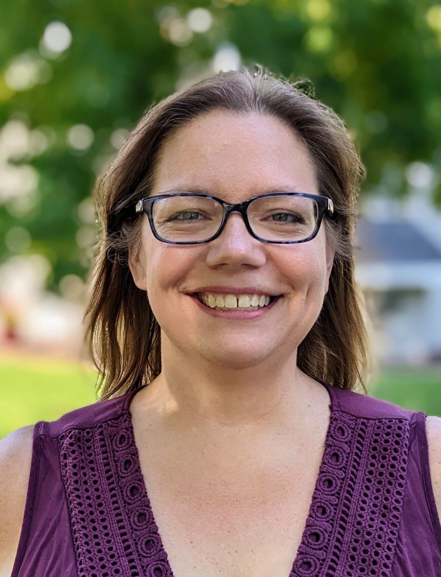 Journalist-Janelle-Bradley-poses-for-a-photo-on-Sept.-2,-2022,-outside-her-Albertville,-Minn.-(Courtesy-of-Jen-Moeller)