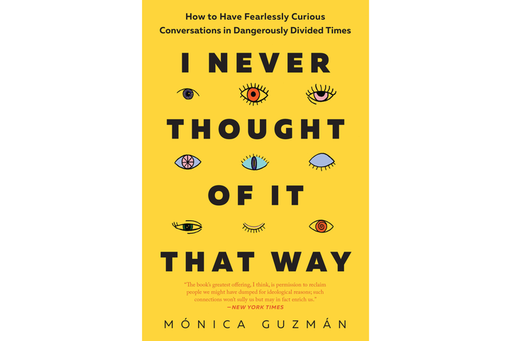 The cover of a book. It's yellow with different types of cartoon eyeballs drawn on it. 