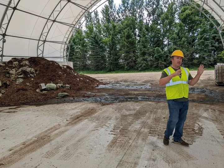 Pope/Douglas Solid Waste Management Environmental Coordinator Nathan Reinbold leads a tour of the new Glacial Ridge Compost F