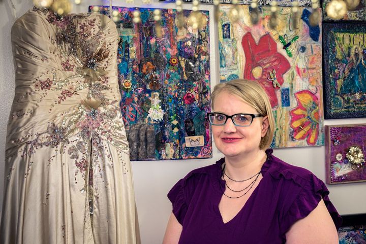 Artist Phena Keil poses for a photo with her work in Fergus Falls, Minn., on May 5, 2023. (R.C. Drews for Project Optimist)