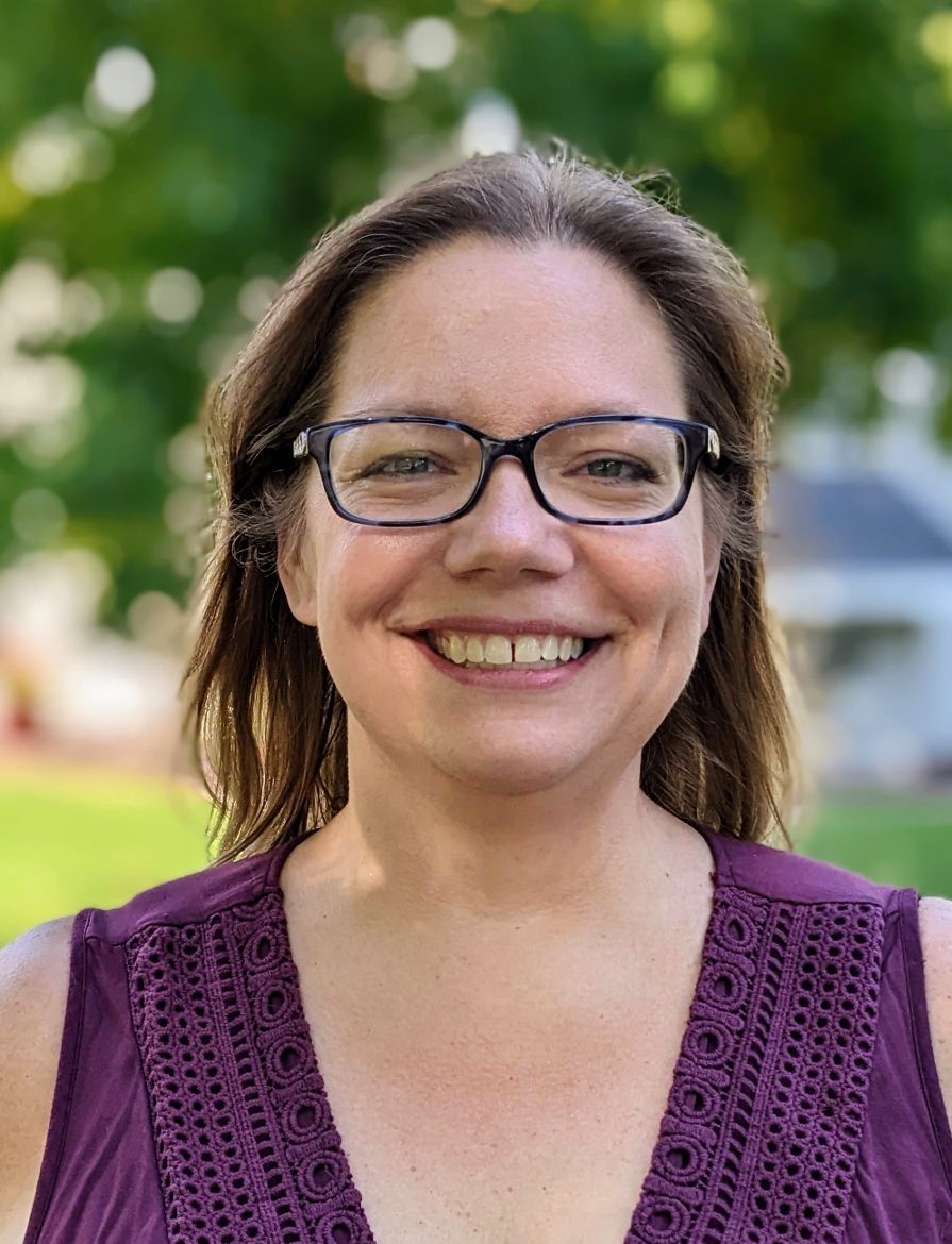 Journalist Janelle Bradley poses for a photo on Friday, Sept. 2, 2022, outside her Albertville, Minn., home where she lives with her husband and two children. (Courtesy of Jen Moeller)